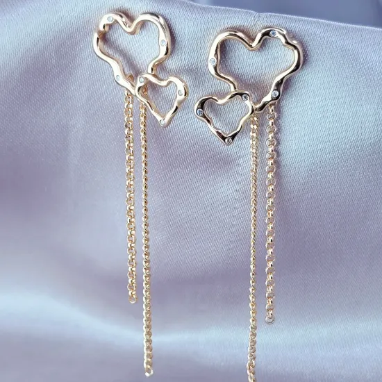 Imagen de Arete Dos Corazones que Motivan