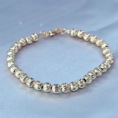 Imagen de Pulsera Tejido Esferas o Municiones Texturizado Oro Dorado Talla 2005