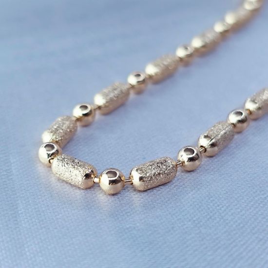 Imagen de Cadena Tejido Punto Liso y Coma Azucarada Oro Dorado